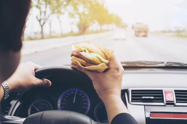 How Eating and Driving Can Be Dangerous